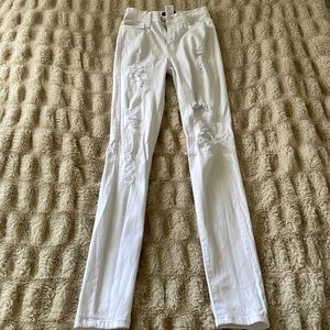 Fashion Nova white ripped jeans! Size 1 waist 24